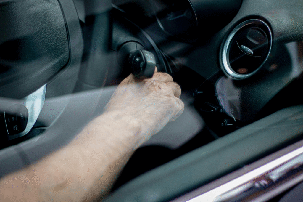 Person trying to remove keys stuck in ignition